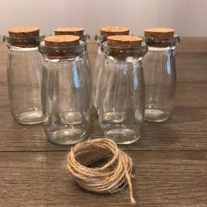 COPY - Glass bottles with cork stoppers and jute to wrap around the bottle neck…